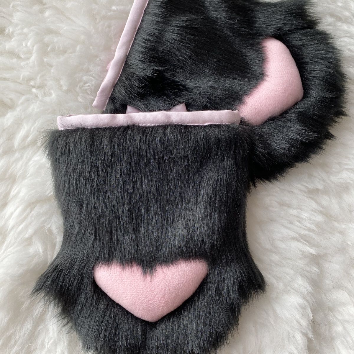 Furry handmade love pads close to the claws