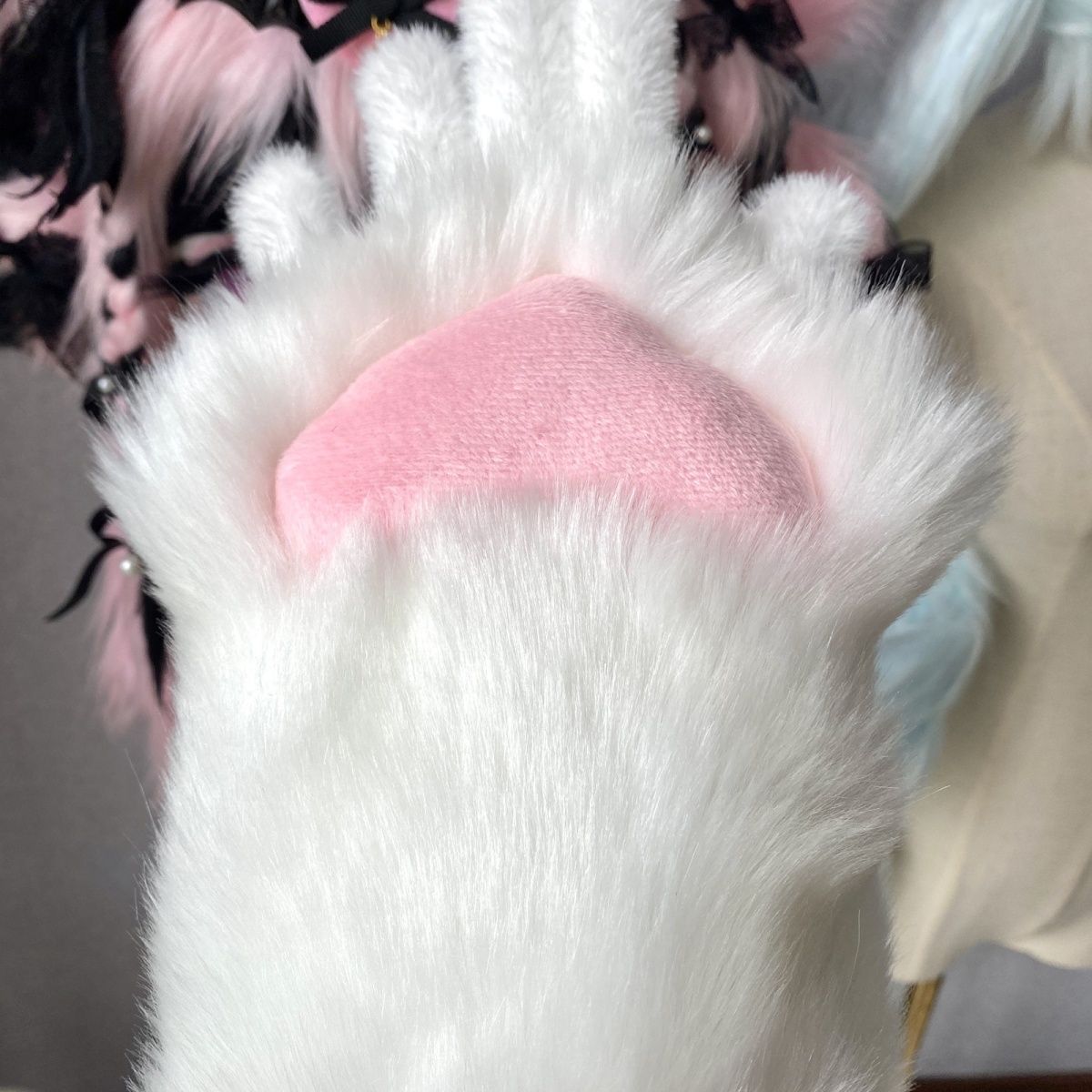 Furry handmade love pads close to the claws