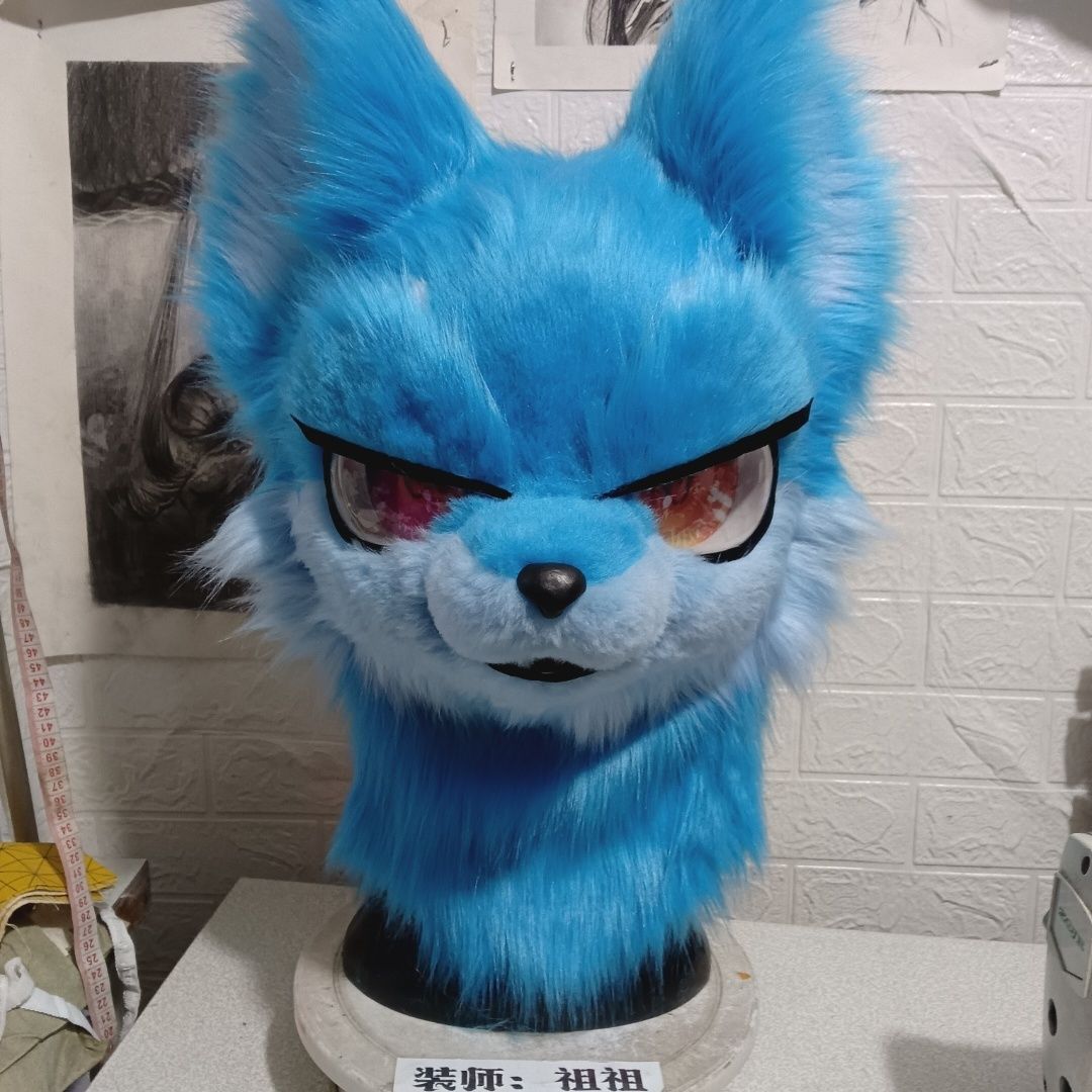 Furry head with half-covered eyelids