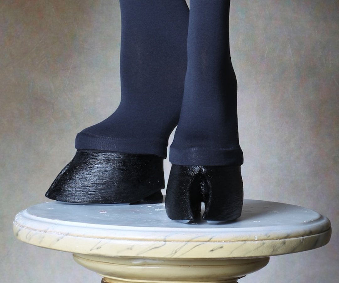 Black furry horseshoe shoes