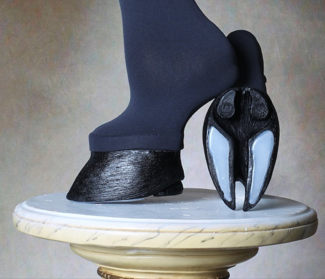 Black furry horseshoe shoes