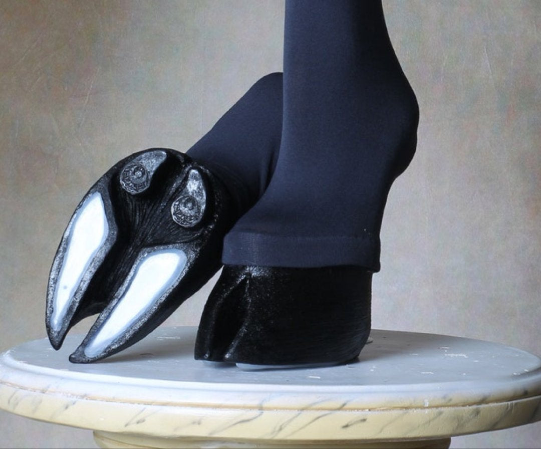 Black furry horseshoe shoes