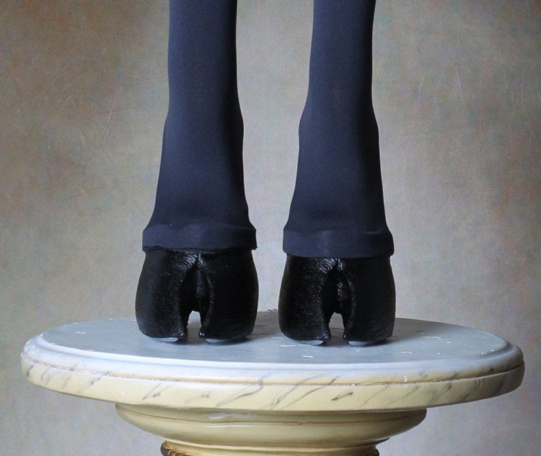 Black furry horseshoe shoes
