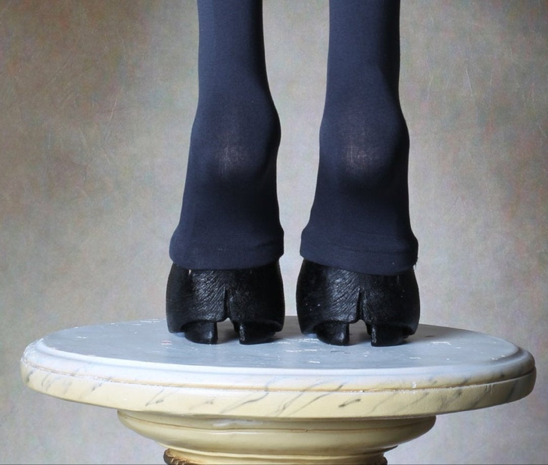 Black furry horseshoe shoes