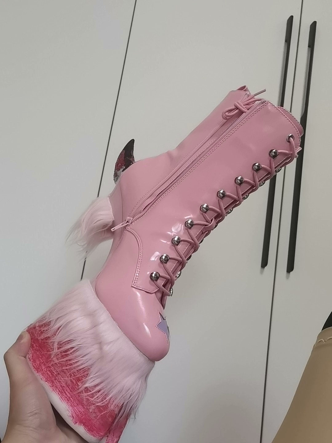 pink furry horseshoe shoes