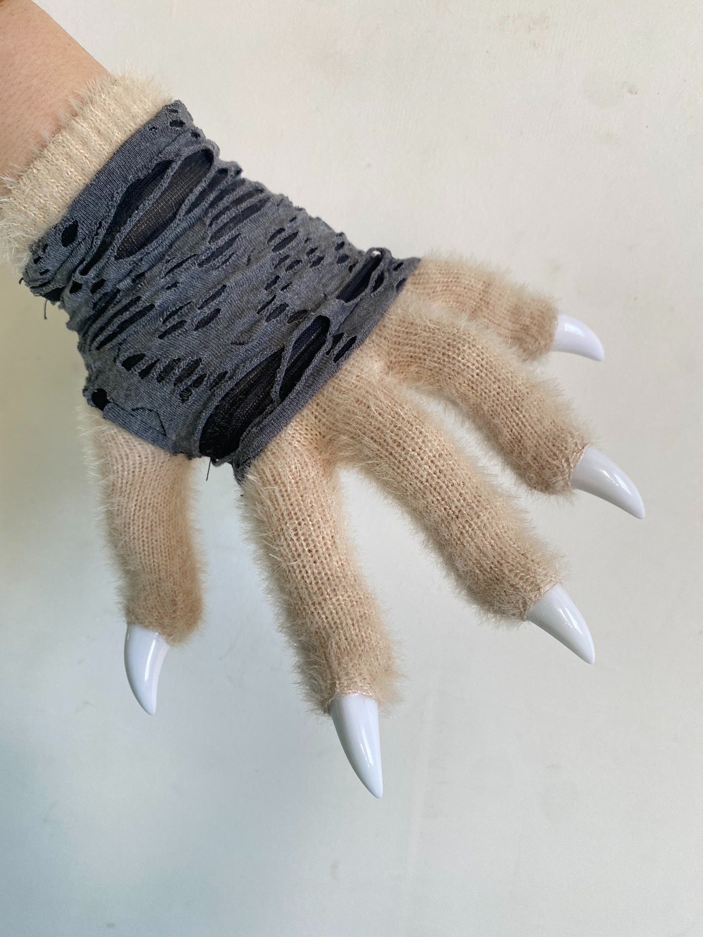 fur suit claws