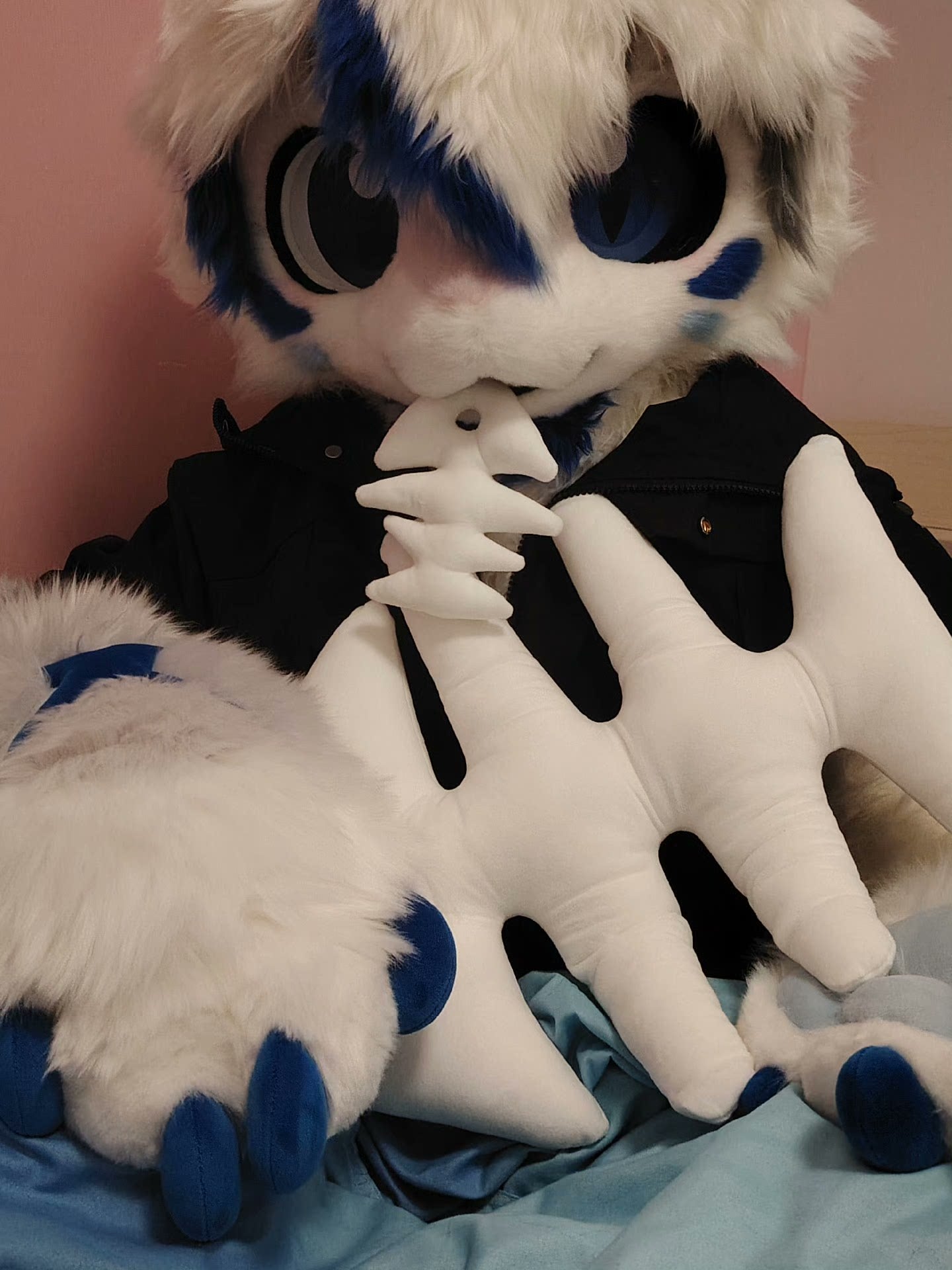 Furry plush fish bone